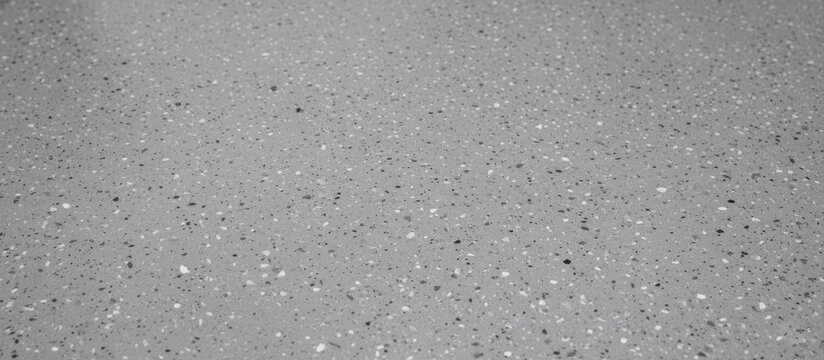 Seamless grey epoxy terrazzo garage floor texture
