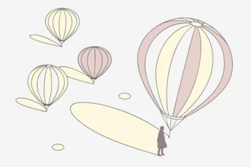 Fotobehang Luchtballon Person holding a large hot air balloon with smaller balloons in the background  © stock