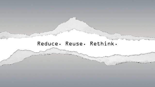 Inspirational quote “Reduce. Reuse. Rethink.” in green typography on torn paper texture. Minimal eco message promoting sustainability and mindful living.
