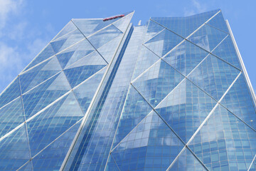 Fototapeta premium abstract oblique angle skyward view of CIBC Square, designed by WilkinsonEyre and Adamson Associates Architects, located at 81 and 141 Bay St, Toronto
