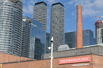 Naklejka premium detail view of The Power Plant Contemporary Art Gallery at Harbourfront Centre located at 231 Queens Quay W, Toronto (includes modern office towers and condos, looking northeast)