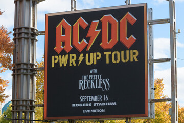 Fototapeta premium Exhibition Place digital roadside billboard featuring a concert promotion for AC/DC PWR/UP Tour (September 16, 2026)