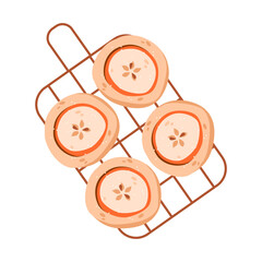 Apple slice cookies on cooling rack. Freshly baked cookies with apple slice resting on a cooling rack, ideal for autumn treats, cozy baking, or seasonal designs.