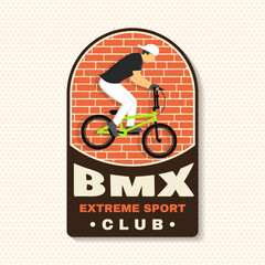 Fototapeta premium Bmx extreme sport club badge, patch, sticker. Vector. Concept for shirt, logo, print, stamp, tee with man ride on a sport bicycle. Vintage typography design with bmx cyclist silhouette.