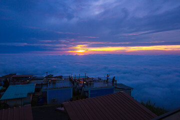 light of sunrise with sea of mist