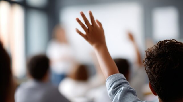 student raising hand in classroom, active participation, learning excitement