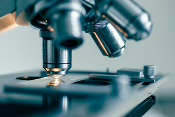 Close-up of laboratory microscope lens