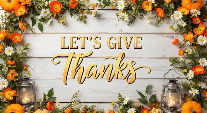 Rustic wooden background with autumn floral garland and lanterns featuring the phrase let s give thanks