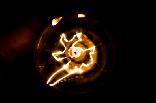 incandescent bulb from bellow - Powered by Adobe