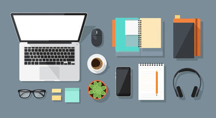 Modern Desk Setup with Laptop, Coffee, and Office Supplies - Top View