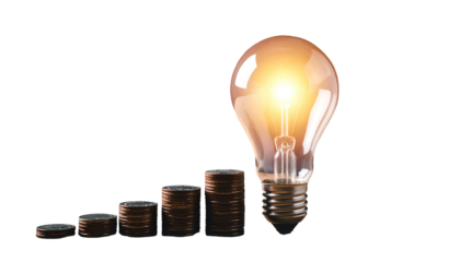 A glowing lightbulb representing an idea, next to a rising stack of coins on black