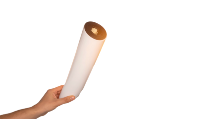 Human hand holding cylindrical object, end cap detail, against black background