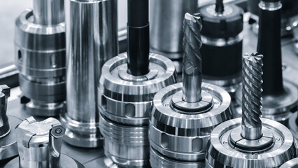 Tool drills, milling cutters for metalworking CNC multifunctional milling drilling grinding tool automatic machine, industrial concept background. © Aleksandr Matveev