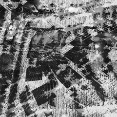 Fragments of Chaos in Monochrome Motion