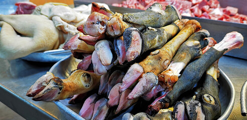 Pile of roasted lamb legs