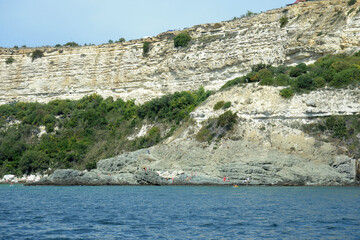 The beach at the steep coast of the Black Sea in Sevastopol