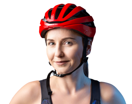 A young female cyclist wearing a safety helmet and glasses, dressed in a bib shorts poses against a black background in the studio.