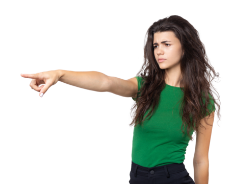 Happy young caucasian female in a shirt pointing fingers away