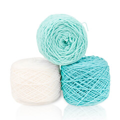 White and green knitting yarn isolated on white background