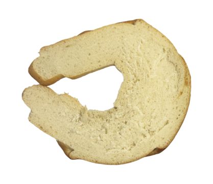 Dry rusk bread slice isolated for design element. Abstract food typography concept. Creative cutout of a toasted bakery product. Natural carbohydrate snack with a hole