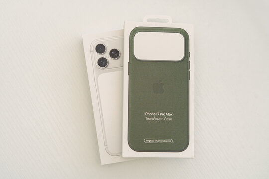 iPhone 17 Pro Max box and green woven Apple case &ndash; editorial photo