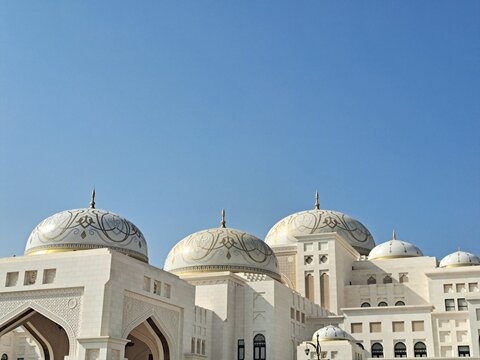 Decorated Domes of Qasr Al Watan - UAE Presidential Palace - against Clear Blue Sky in Abu, Dhabi, UAE