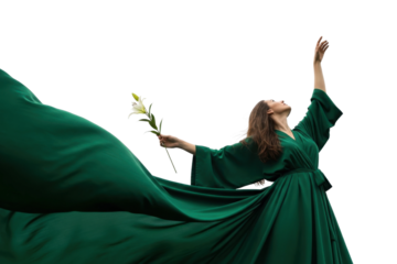 An elegant woman in a flowing green gown holds a lily while reaching towards the sky