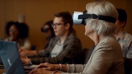 Senior woman using virtual reality headset in modern classroom with students learning new technology and digital innovation together - Powered by Adobe