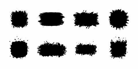 Collection of eight black ink splatters and brush strokes on a white background