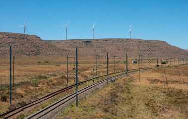 Railway line beneath the Noupoort Wind Farm. Tzhe farm is operational and has 35 turbines which generate a total of 80MW.
