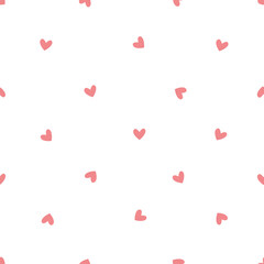 A seamless pattern with pink hearts. This hand drawn for wrapping paper and cards for Valentine's Day. Illustration is simple kid's style.