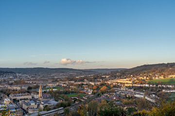 Obraz premium Panoramic view of cityscape at sunset