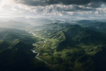 Meandering river flowing through vast green valley