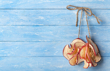 dried apple chips hanging on the wall