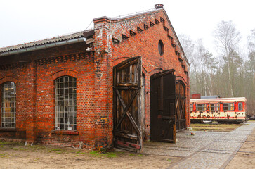 Historic Brick Railway Depot with Old Train