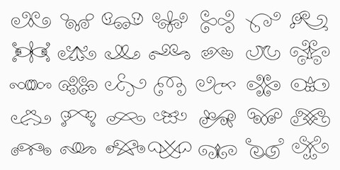 Collection of elegant hand drawn black decorative flourishes and ornamental swirls on white background