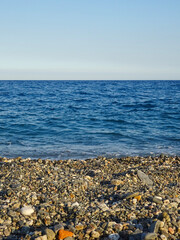Balanced Composition of Beach, Sea and Sky near Taormina, Sicily, Italy at the Coast