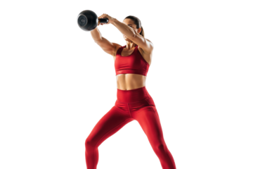 Fit woman in red sportswear performing a kettlebell swing
