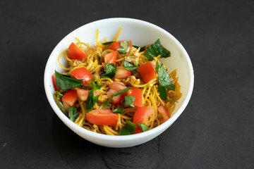 Vegetable noodle salad bursting with fresh tomatoes and aromatic herbs, a healthy and delicious meal for any occasion. Perfect for promoting wellness and culinary delight.