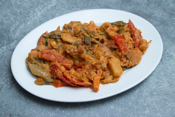 Vegetable dopiaza Indian curry, a delicious blend of tomatoes, potatoes, and aromatic spices. Perfect for menus, blogs, and culinary features.