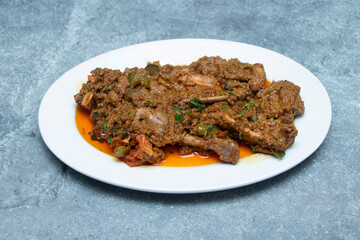 Spiced chicken tawa curry, a flavorful and savory dish perfect for any meal. Experience authentic taste and aroma.