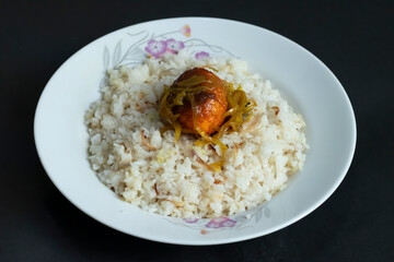 fried egg pulao atop fluffy white rice, a visually appealing and delicious meal perfect for any dining occasion.