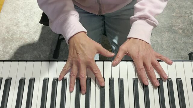 Close up view of woman hands playing music