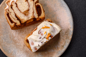 Cinnabon, a sweet cinnamon pastry, a high calorie bun or roll. Cinnabon with cinnamon