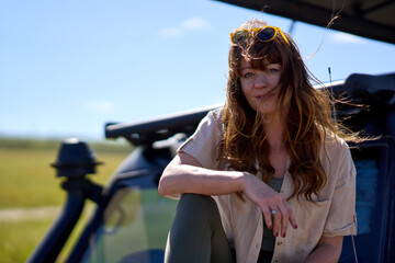 Ginger woman with sunglasses on Safari © Roberto Vivancos