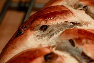 Close-up of freshly baked homemade challah bread or raisin zopf
