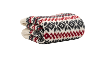 A cozy folded woolen blanket featuring a traditional red, black, and white Nordic geometric pattern, isolated on a clean isolated on a transparent background