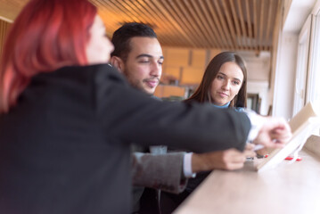 Fototapeta premium Business Meeting in a Modern Cafe – Teamwork and Collaboration Concept
