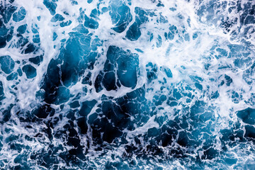 Ocean water background. Top view of vibrant foamy water. Can be used in covers, packaging, posters, textures, cards, art and design projects. Creative vector illustration.