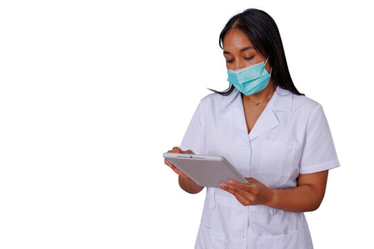 Medical professional woman wearing a face mask and white uniform using a digital tablet for healthcare technology, transparent background